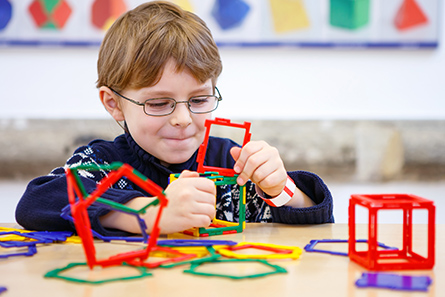 Child Playing With Construction Toys Child Playing With Construction Toys